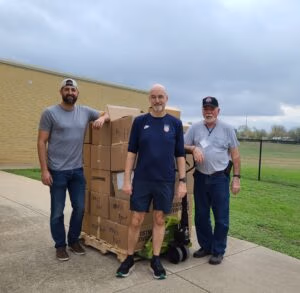 Volunteers - moving boxes
